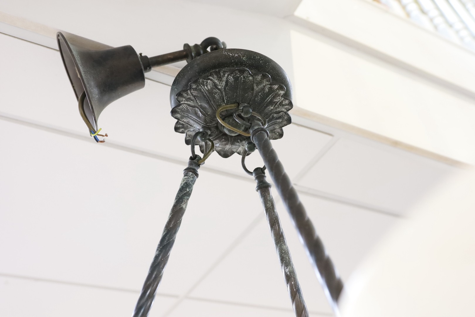 An Empire style bronze and an alabaster chandelier